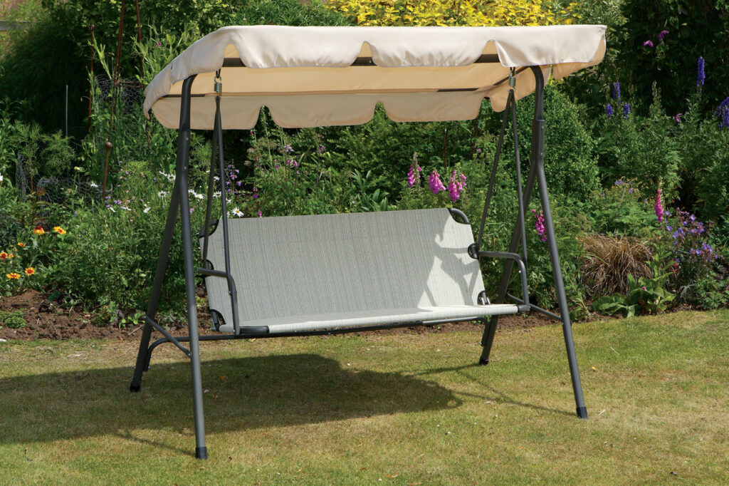 beautiful garden swing with a canopy