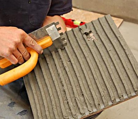 Укладка кафельной плитки на бетонное основание